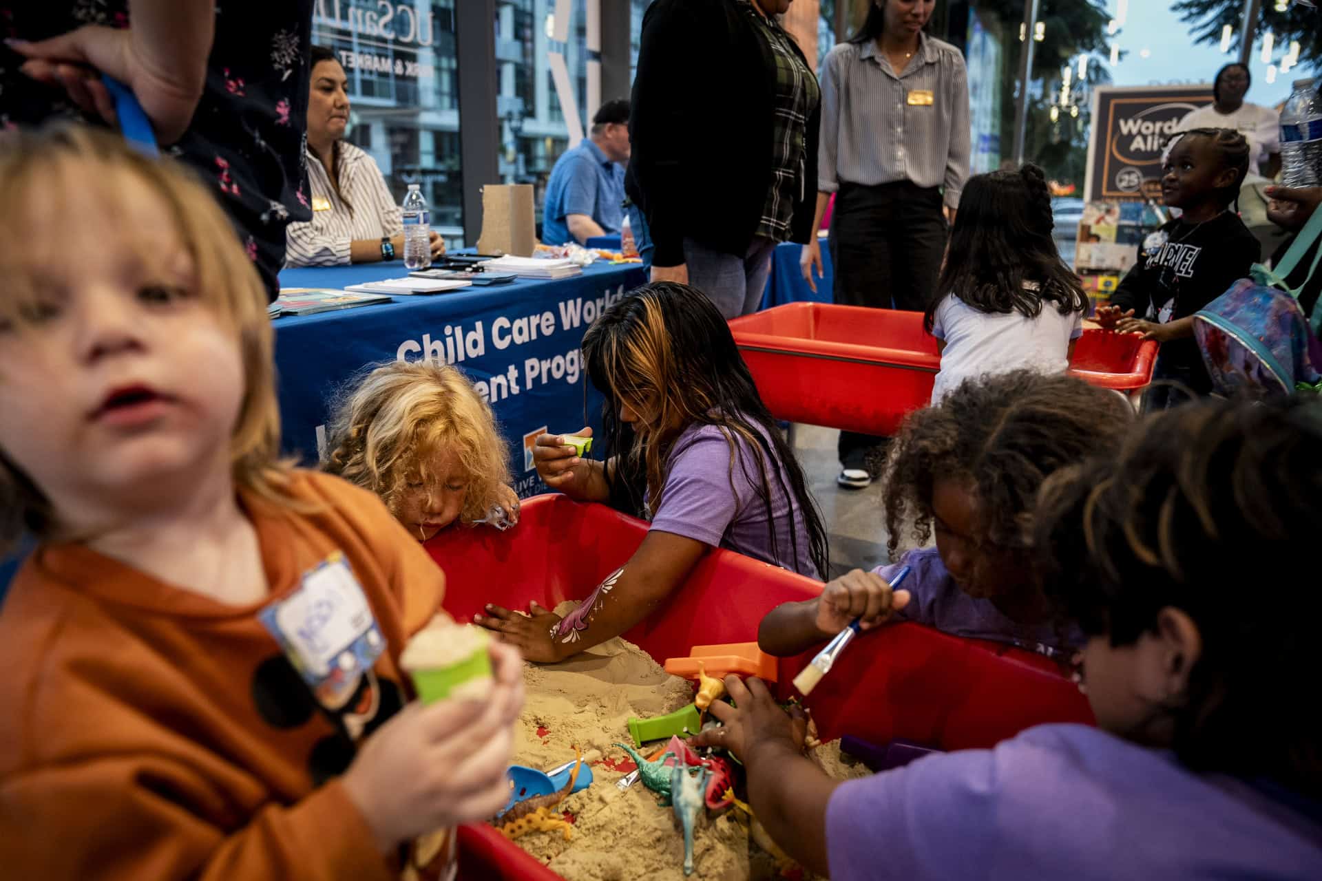 Kids play in a sandbox