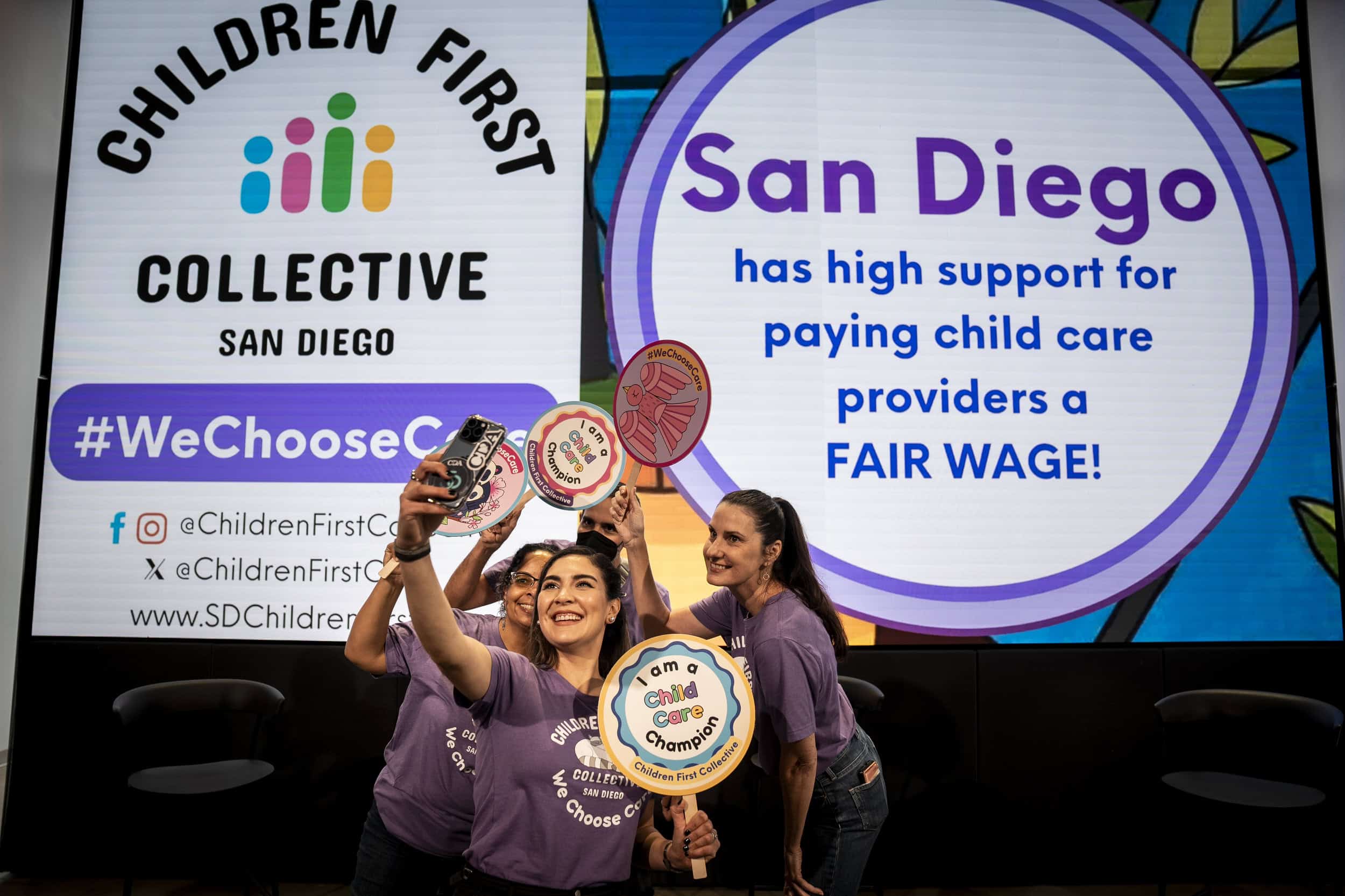 People attend the Children First Collective’s “We Choose Care” event